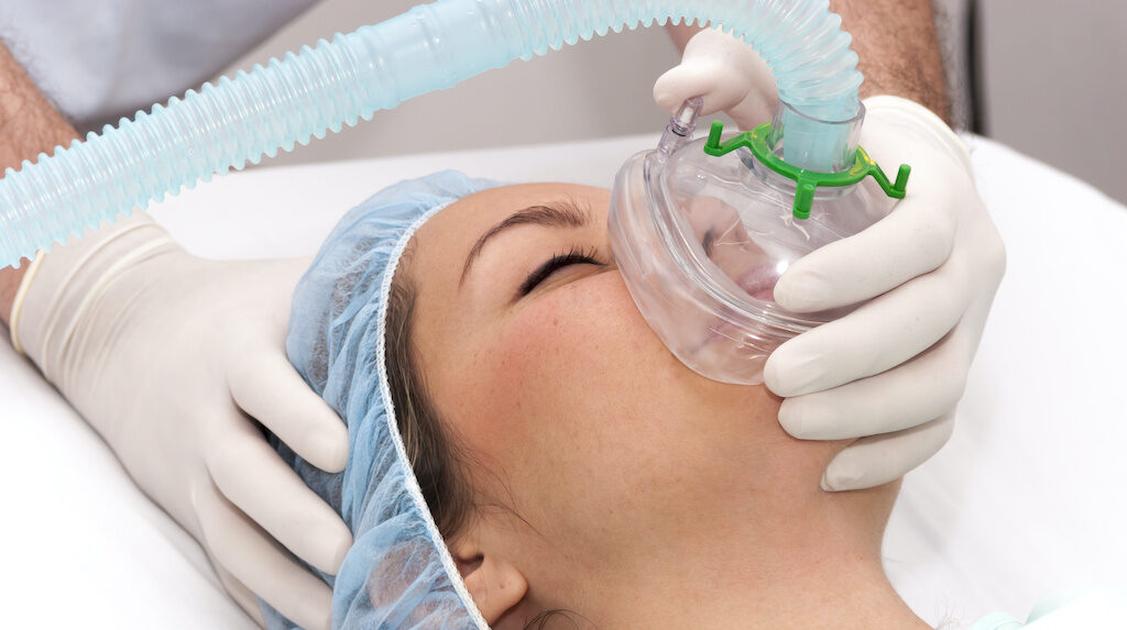Woman having anesthesia for her oral surgery procedure